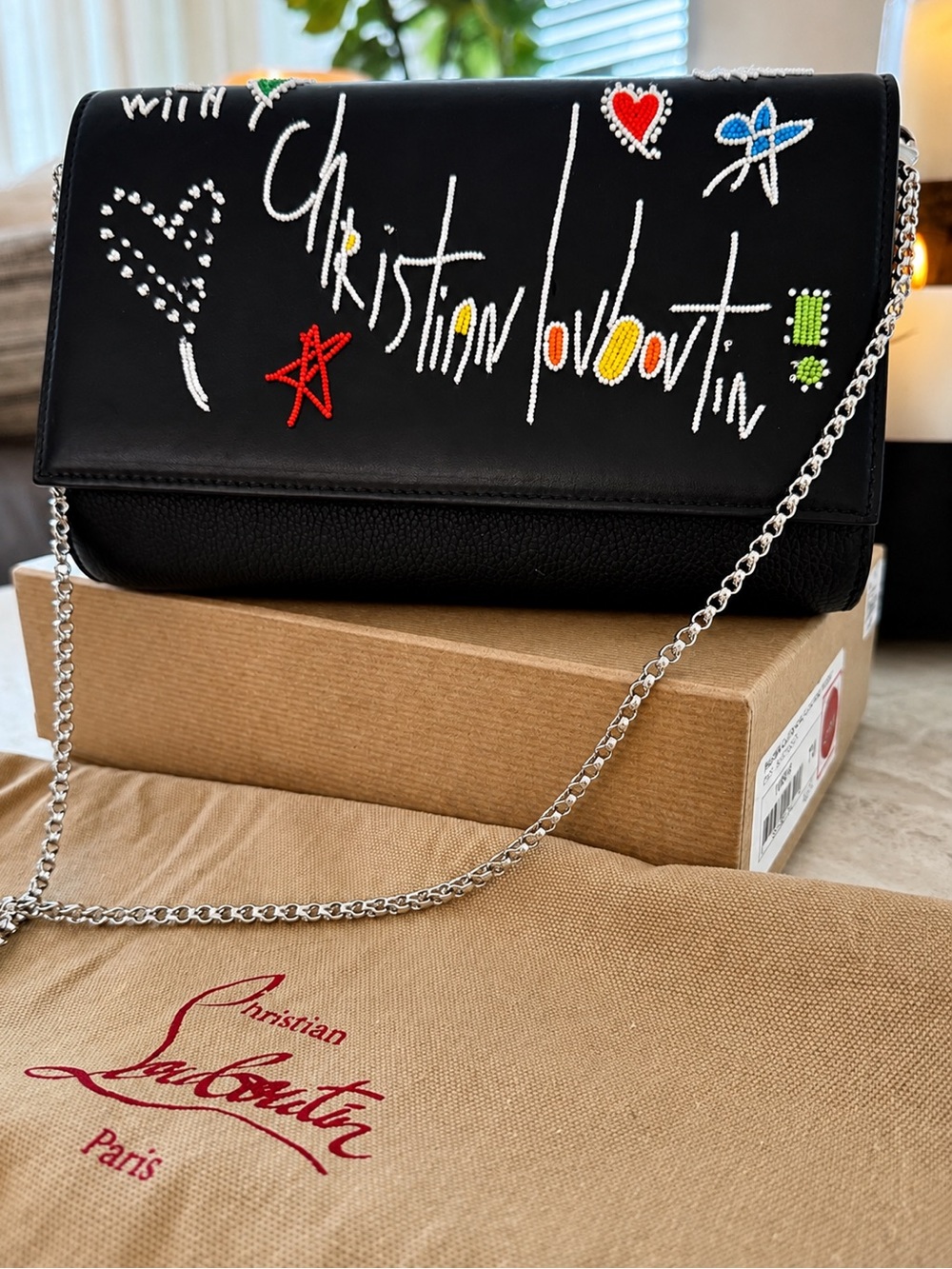 CHRISTIAN LOUBOUTIN 
Paloma Loubitag Leather Clutch W/ Beading